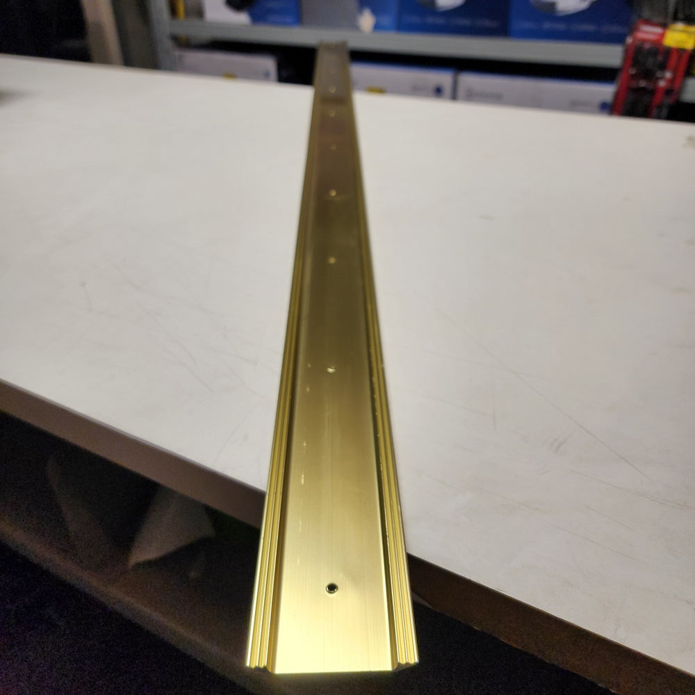 Flat Top 2-1/2 in. x 57 in. Brite Gold Aluminum Saddle Door Threshold (99023057000)