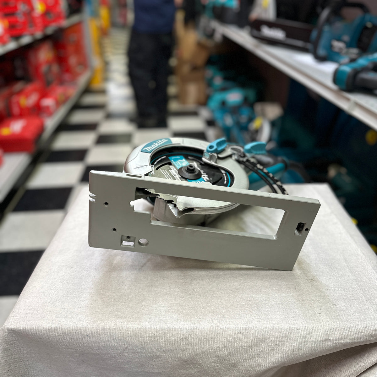 Makita 5377MG saw label showing 120V 15 amp and 4,500 RPM specifications