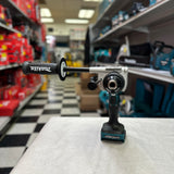 Makita cordless drill, impact driver, two batteries, charger, and bag displayed together