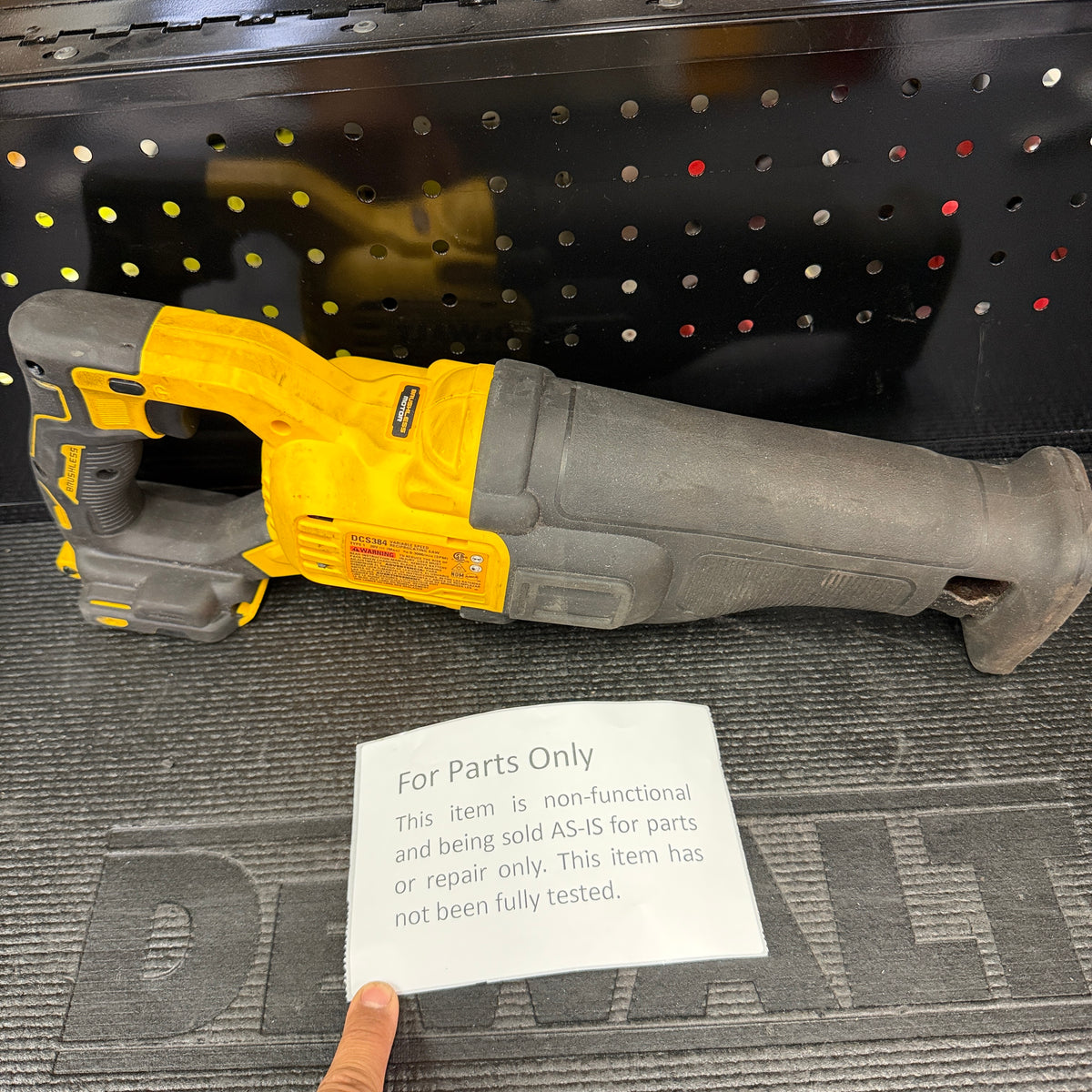 DEWALT DCS384 with Tools For Less For Parts Only sign